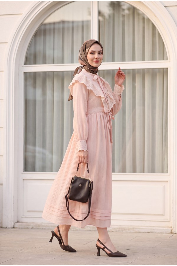 Lined crinkle dress with lace detailing at the neckline and waist. -Powder