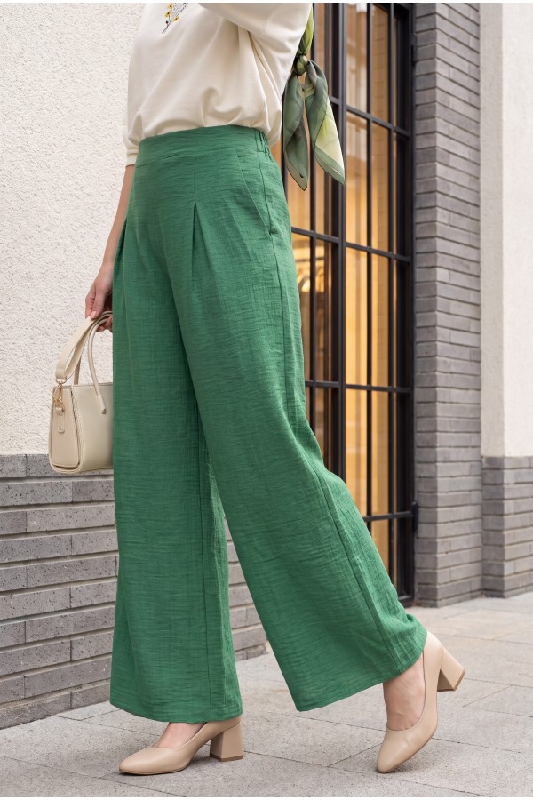 Wide-leg pleated linen-look trousers with elasticated waist. -Green