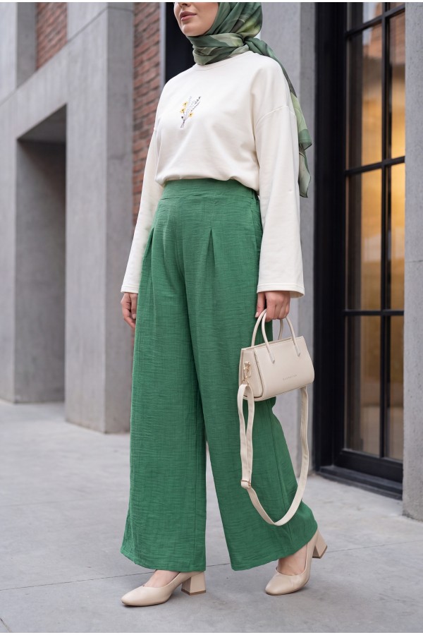 Wide-leg pleated linen-look trousers with elasticated waist. -Green