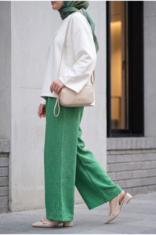 Wide-leg pleated linen-look trousers with elasticated waist. -LIGHT GREEN