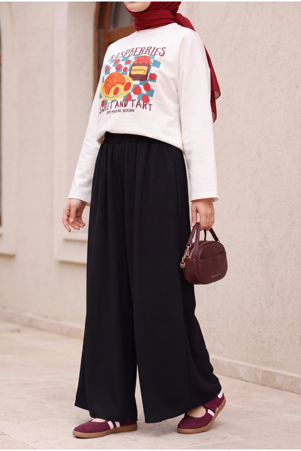 Linen-look skirt/pants with elasticated waist, belt, and pockets. -Black