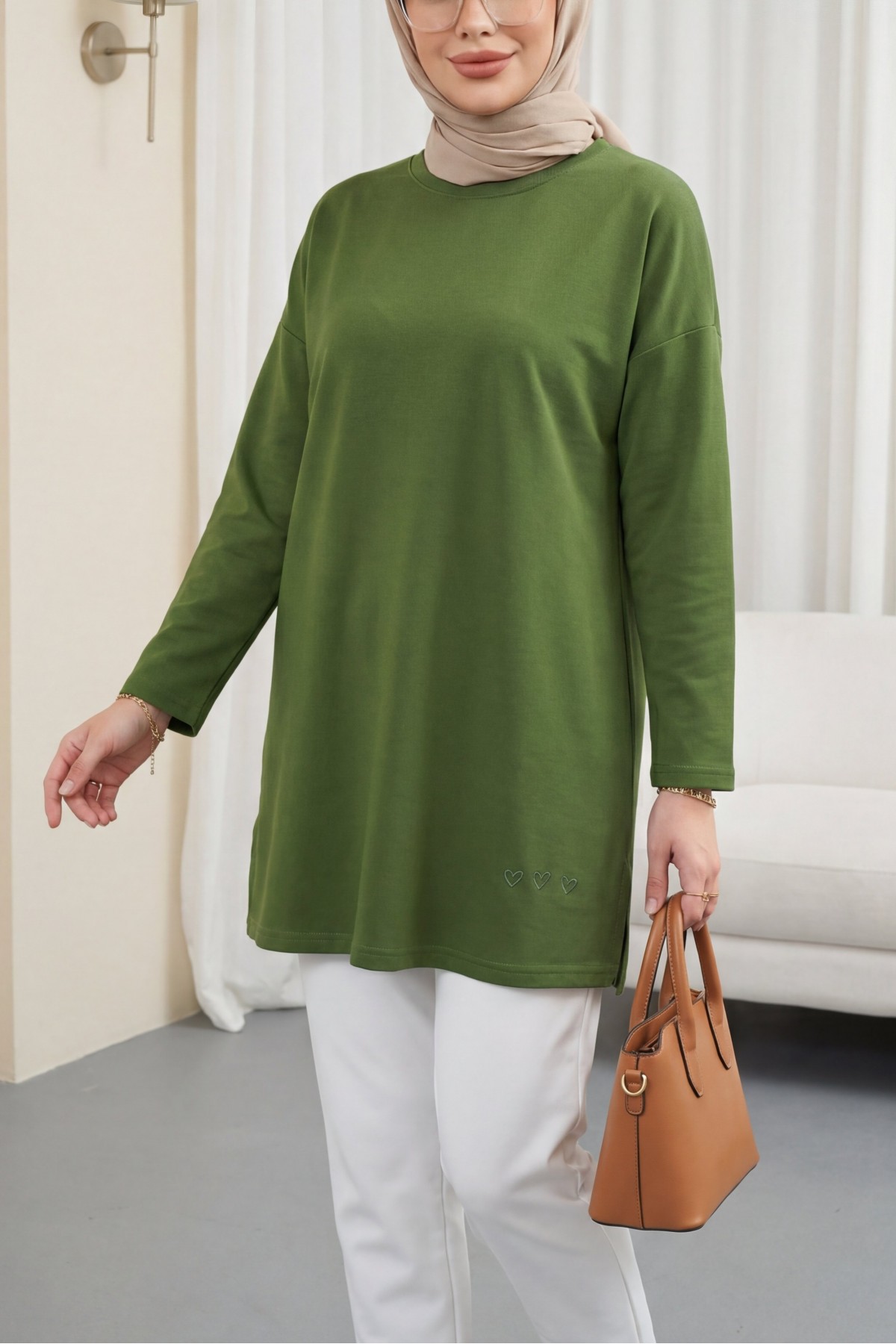 Loose-fitting cotton tunic with heart detail and slit at the hem. -Khaki