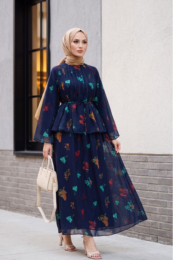 Spanish-style chiffon set with lined sleeves, belt, and floral skirt. -Navy blue