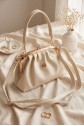 Clip-fastened, long-strap, nostalgic design bag - Beige