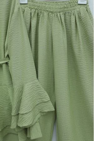 Jacquard Waffle Suit with Ruffled Cuffs and Wide Leg Trousers, and Belt. -PISTACHIO GREEN