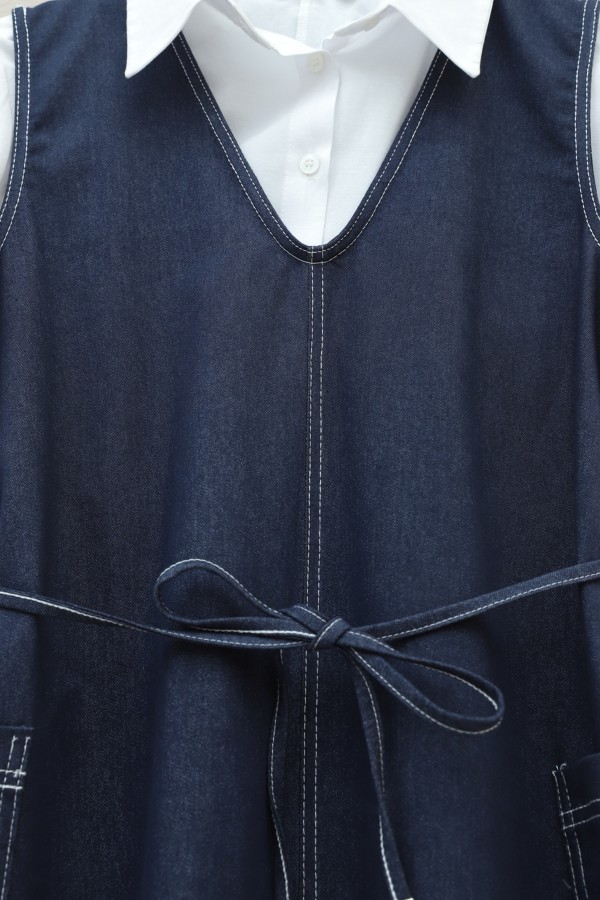 Denim Vest with Double Side Pockets, V-Neck, and Drawstring Waist. -dark lacquer