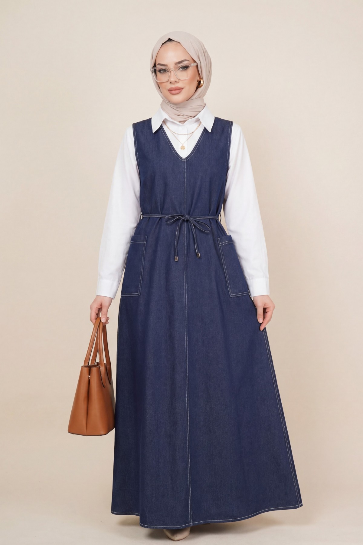 Denim Vest with Double Side Pockets, V-Neck, and Drawstring Waist. -dark lacquer