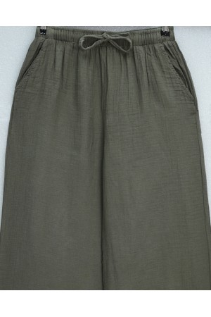 بنطال واسع الساقين من قماش الموسلين مع خصر مطاطي ورباط. -خاكي