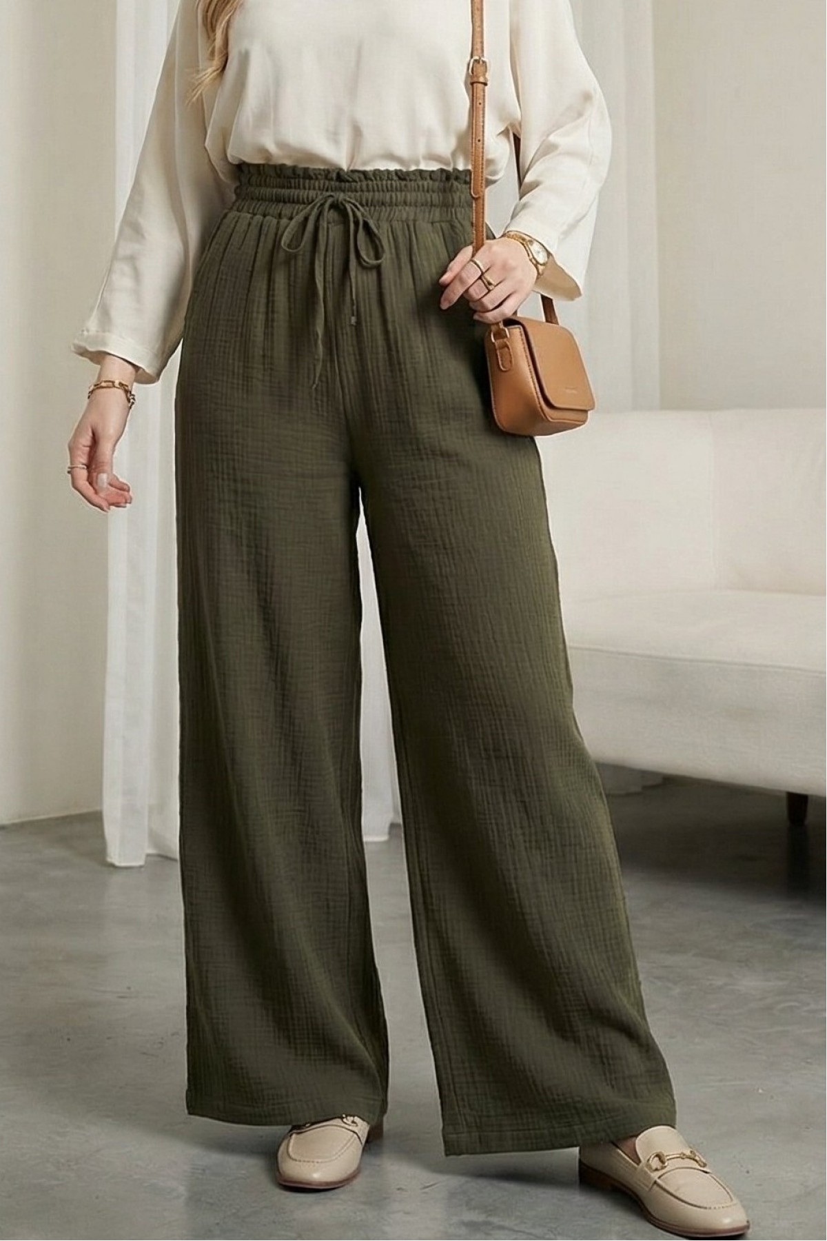 Wide-leg muslin trousers with elasticated waist and drawstring. -Khaki
