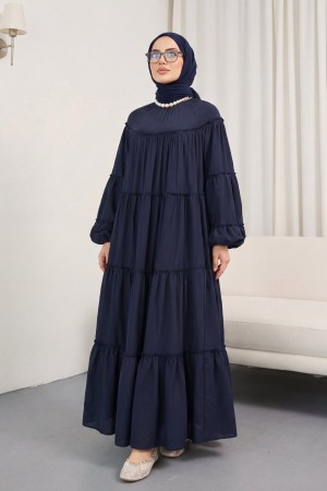 Layered ruffle detailed dress with elasticated sleeves and tie-waist. -Navy blue