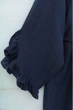 تونيك من قماش المودال بياقة برباط، وسحاب، وأكمام مكشكشة، وحزام. -كحلي