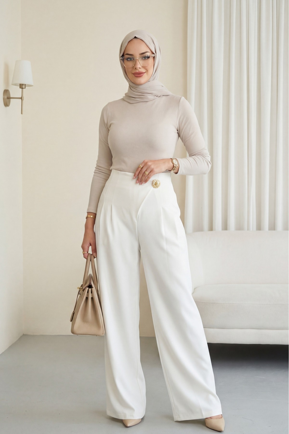 Wide-leg crepe trousers with side zipper, brooch, and folding detail. -White