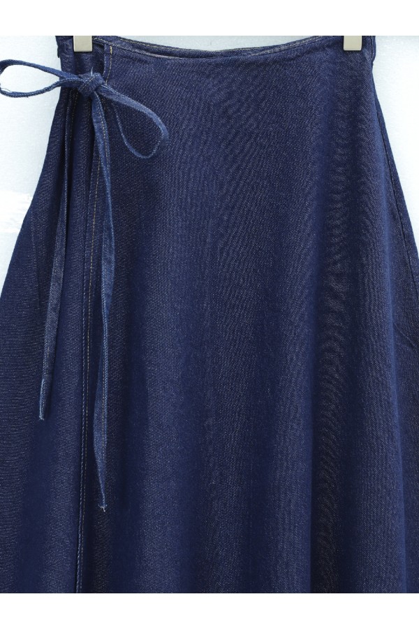 Double-layered denim skirt with side tie waistband. -dark lacquer
