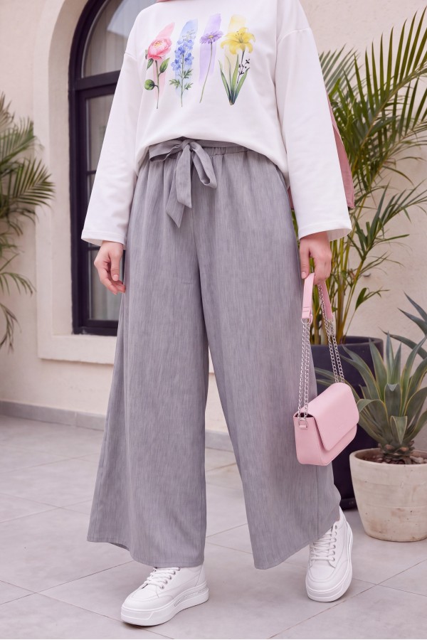 Linen-look skirt/pants with elasticated waist, belt, and pockets. -Grey