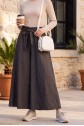 Linen-look skirt/pants with elasticated waist, belt, and pockets. - Soil