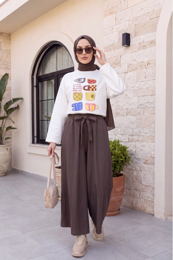 Linen-look skirt/pants with elasticated waist, belt, and pockets. - Soil