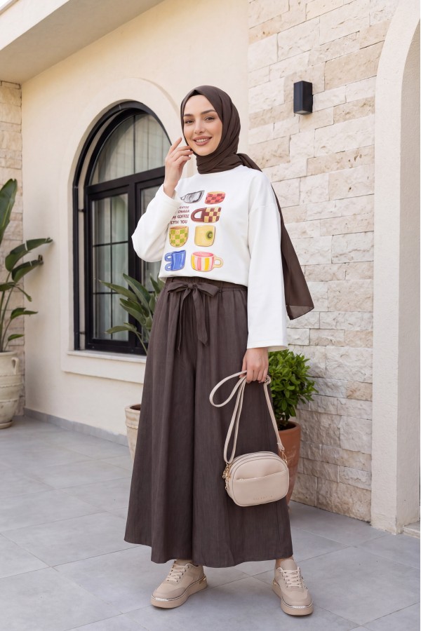 Linen-look skirt/pants with elasticated waist, belt, and pockets. - Soil