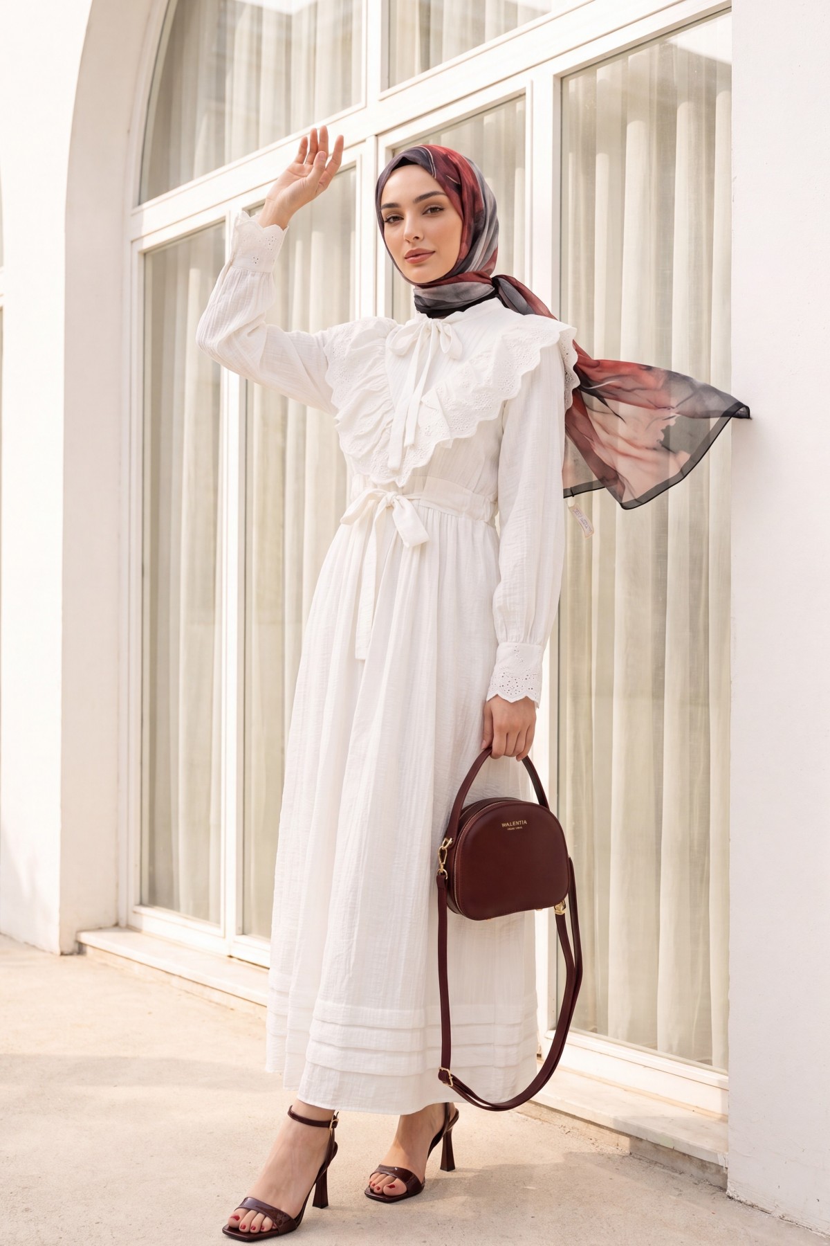 Lined crinkle dress with lace detailing at the neckline and waist.   -White