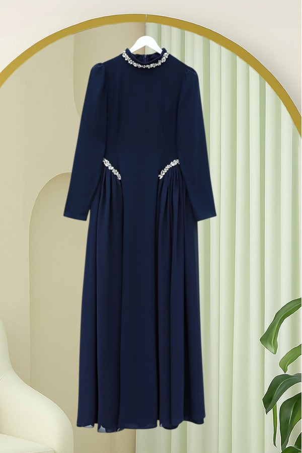 Crepe dress with rhinestone embellishments at the neckline and waist, and tulle details on the sides, now lined. -Navy blue