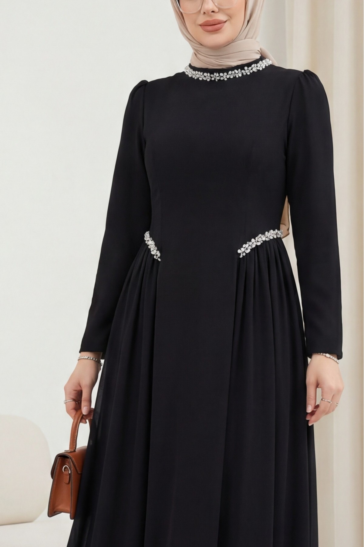 Crepe dress with rhinestone embellishments at the neckline and waist, and tulle details on the sides, now lined. -Black