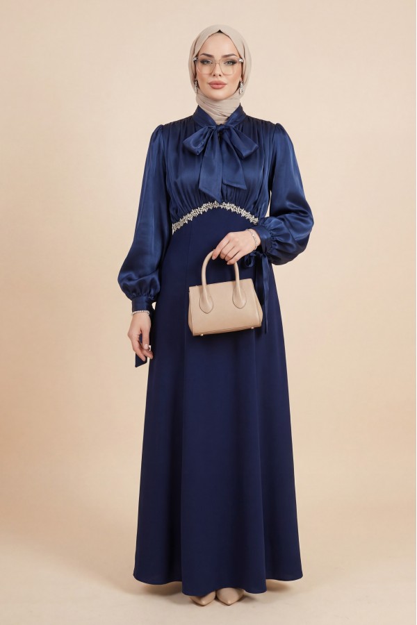 Pleated top with lace-up collar and sleeves, shimmering satin crepe skirt. -Navy blue