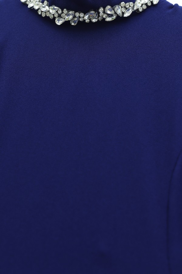 Crepe dress with rhinestone embellishments at the neckline and waist, and tulle details on the sides, now lined.  -Saxe 