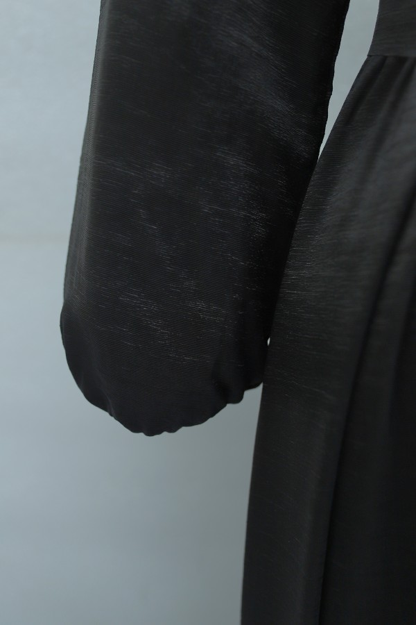 Long dress with ruffled neckline and hem, elasticated sleeves, crinkle crepe lining. -Black