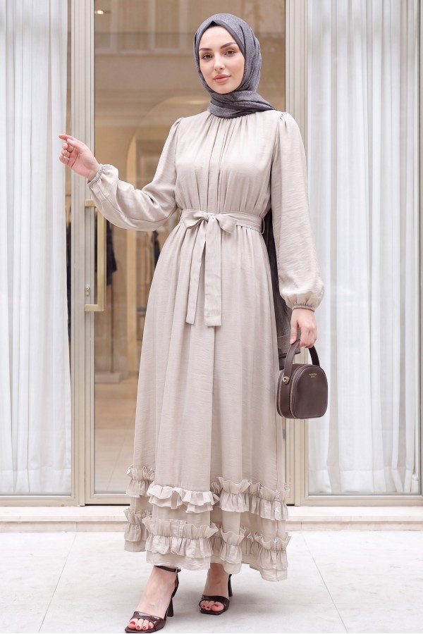 Long dress with ruffled neckline and hem, elasticated sleeves, crinkle crepe lining. -Stone