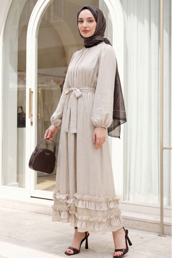 Long dress with ruffled neckline and hem, elasticated sleeves, crinkle crepe lining. -Stone
