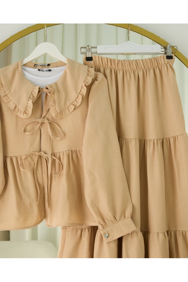 Lace-up suit with layered skirt detail - Beige