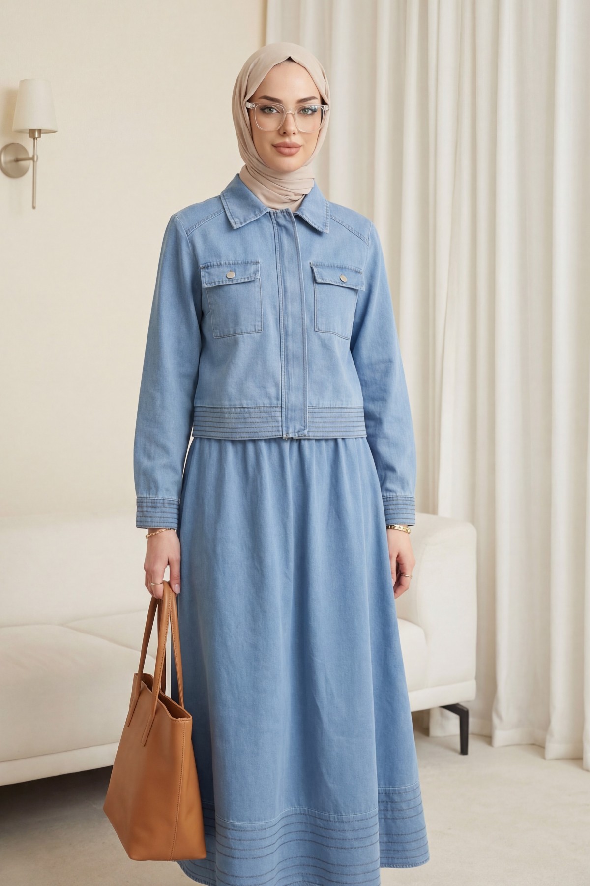 Denim suit with a flared skirt and hidden zippered pockets. -Ice Blue