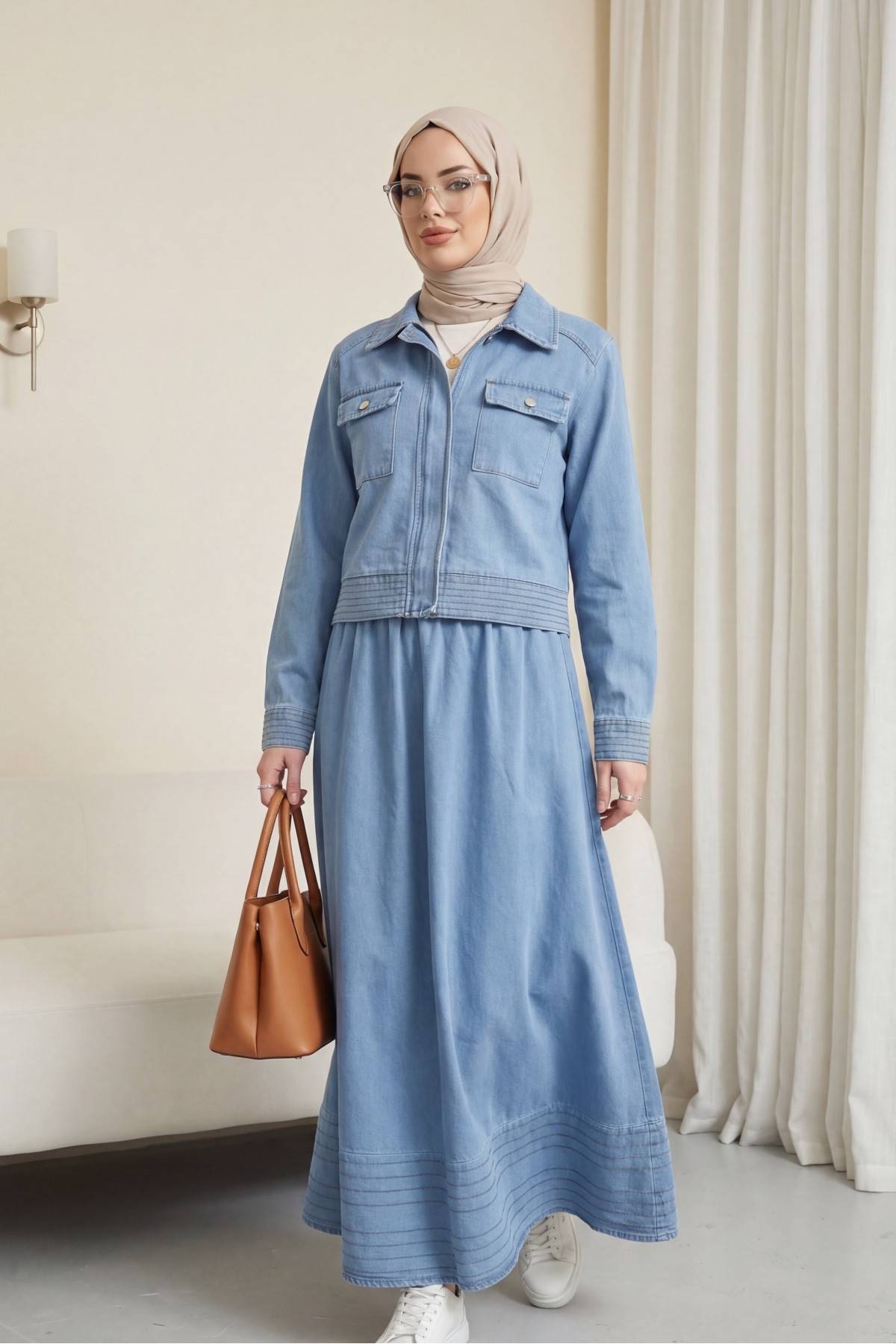 Denim suit with a flared skirt and hidden zippered pockets. -Ice Blue