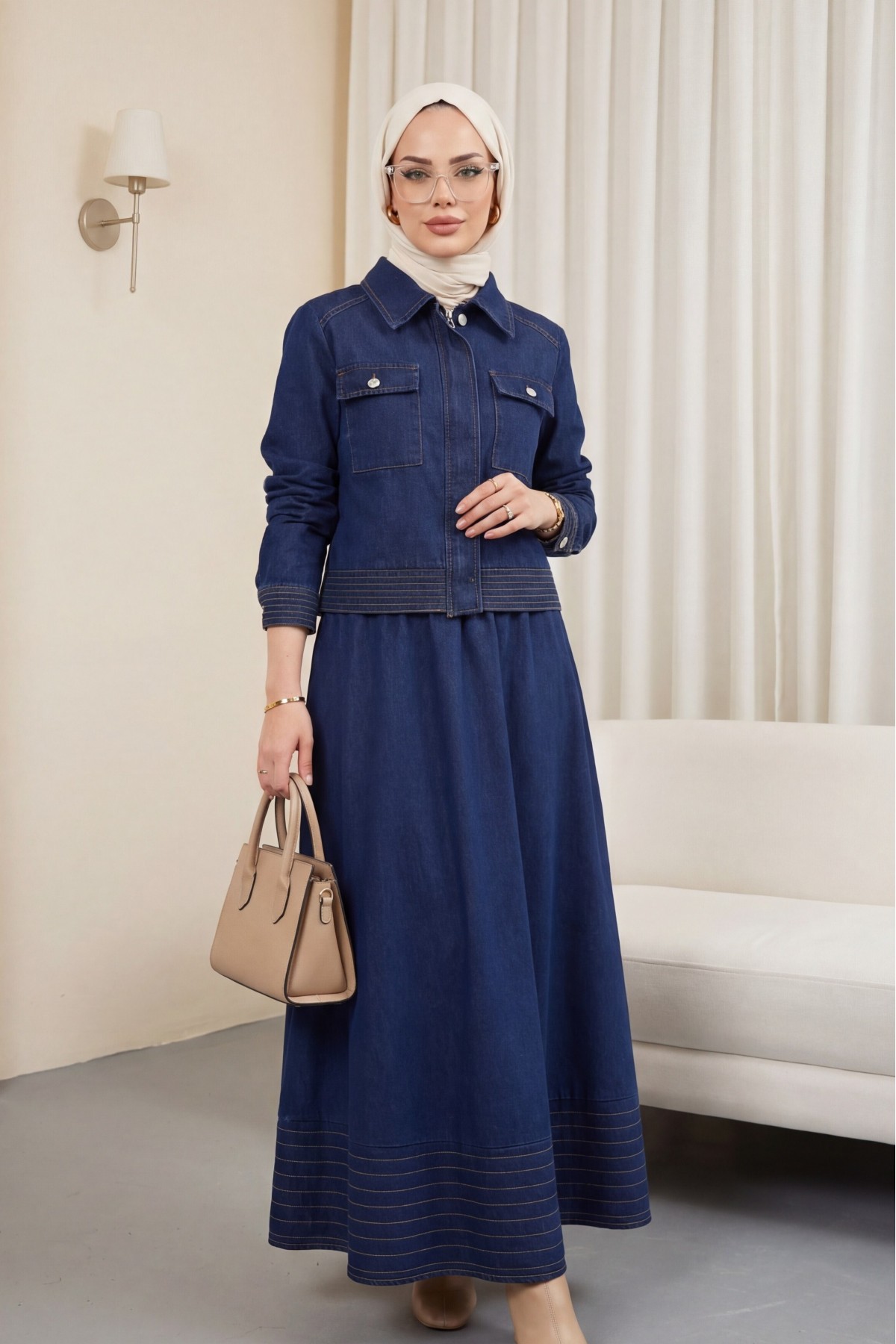 Denim suit with a flared skirt and hidden zippered pockets. -Navy blue