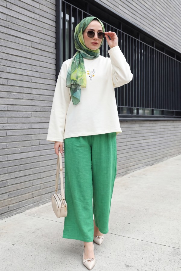 Wide-leg pleated linen-look trousers with elasticated waist. -LIGHT GREEN
