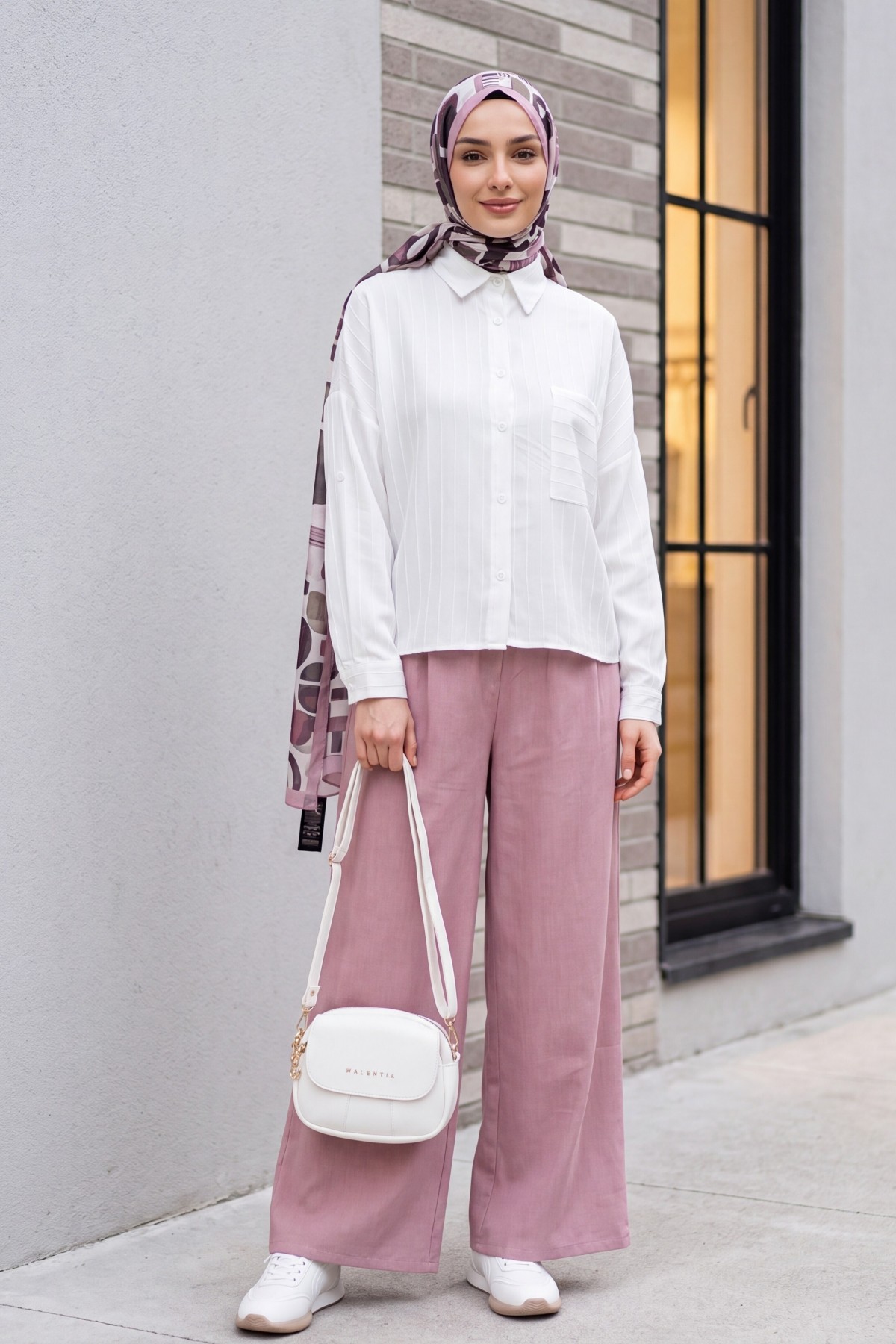 Wide-leg pleated linen-look trousers with elasticated waist. -Powder