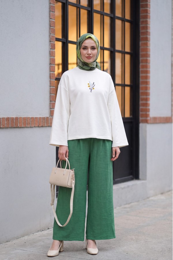 Wide-leg pleated linen-look trousers with elasticated waist. -Green