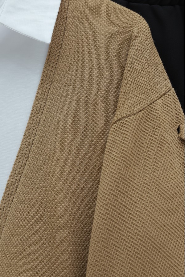 Loose-fitting knitted cardigan with braided sleeves -Mink color