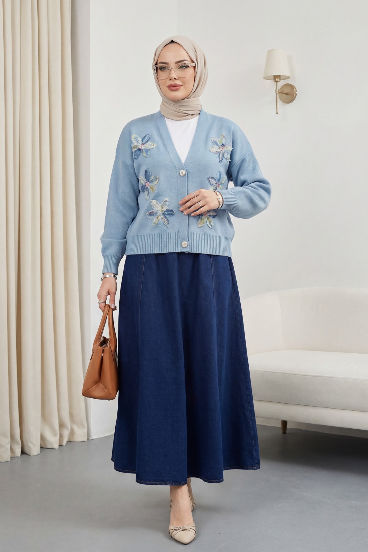 Buttoned knitted cardigan with sequin and floral details on the front. -Blue