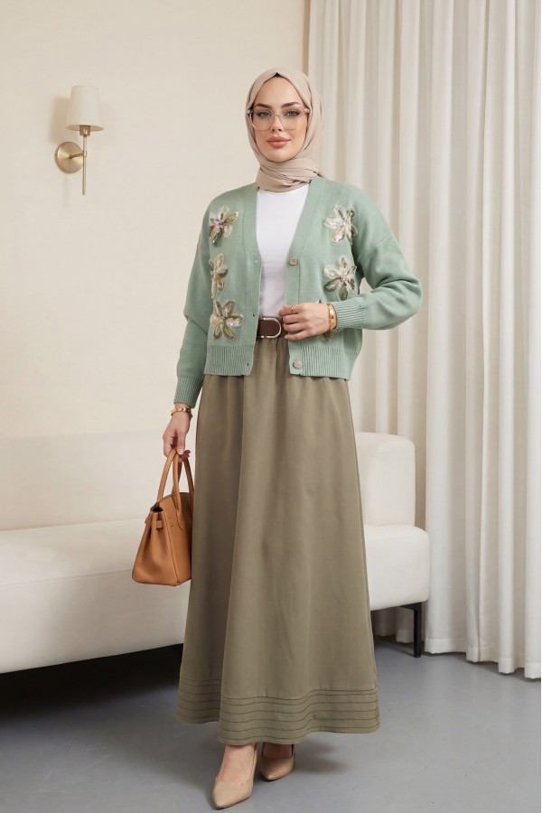 Buttoned knitted cardigan with sequin and floral details on the front. -Sea green