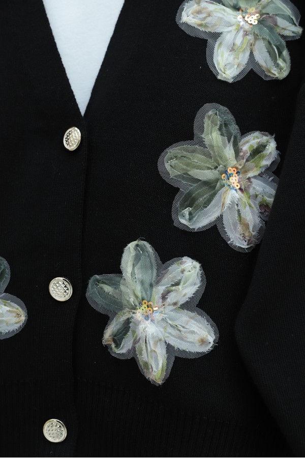 Buttoned knitted cardigan with sequin and floral details on the front.  -Black