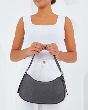 حقيبة باجيت بنية سادة نسائية 010167