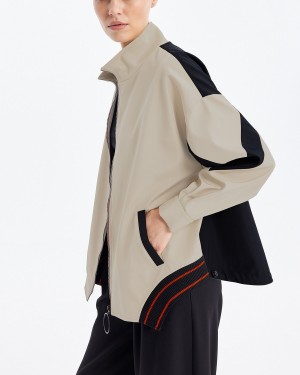 جاكيت نسائي مطاطي بظهر مقسم  