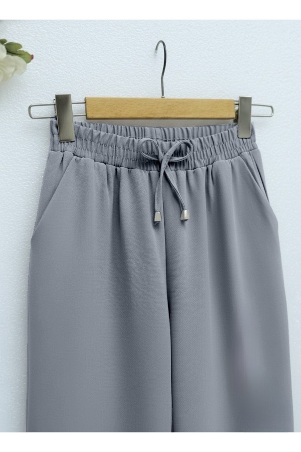Beli Bağcıklı Dar Paça Pantolon    -Füme